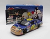 ** Comes w/Picture of Driver Autographing Diecast ** Jimmie Johnson Autographed 2002 Lowe's / Looney Tunes Rematch 1:24 Nascar Diecast ** Comes w/Picture of Driver Autographing Diecast ** Jimmie Johnson Autographed 2002 Lowe's / Looney Tunes Rematch 1:24 Nascar Diecast